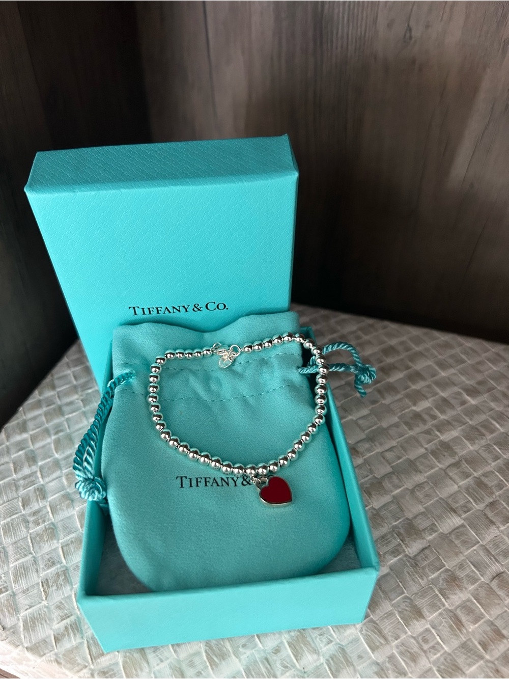 Tiffany & Co. Silver Beaded Bracelet with Red Heart Charm
